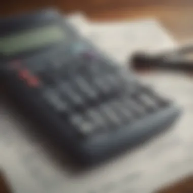 A close-up of a calculator and tax forms