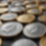 A close-up view of gold and silver coins reflecting light.